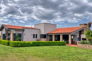 House_Facing_East_with_Clouds-Approved
